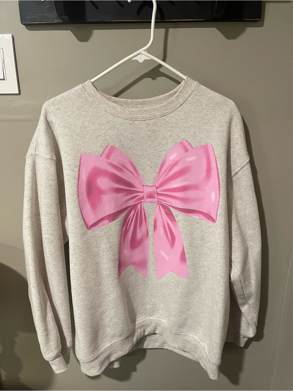 Women’s Cream Sweatshirt with Pink Bow Graphic
